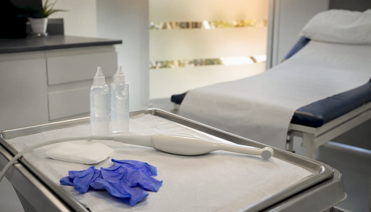 Transvaginal ultrasound probe and gel in clinic